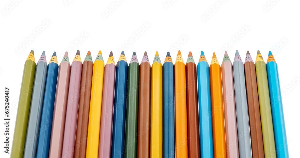 Rainbow colored wooden pencils with faces have many emotions Rainbow colored wooden pencils with faces have many emotions