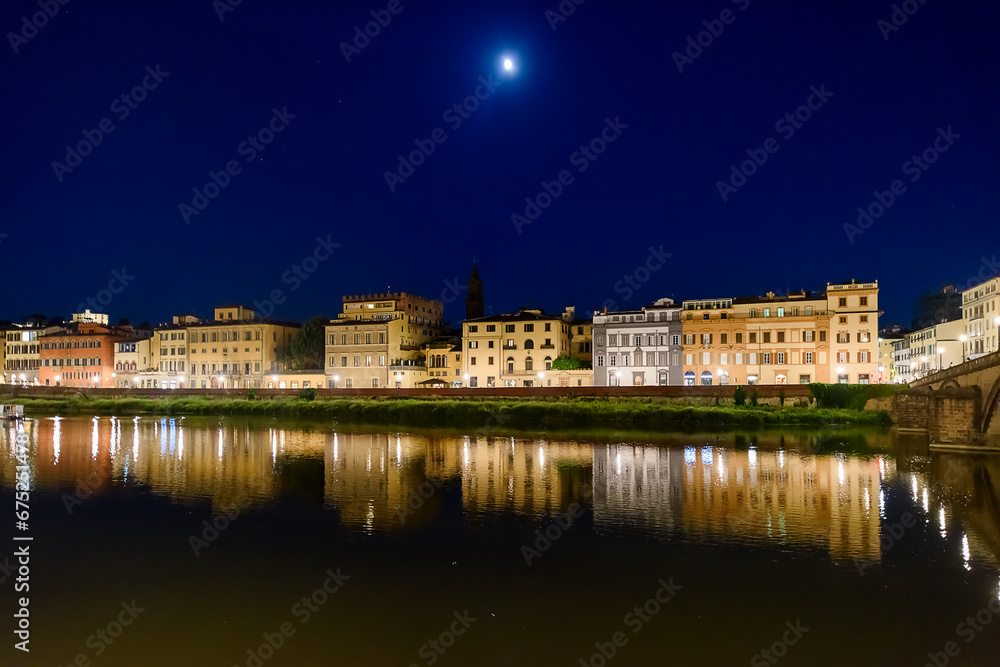 Fototapeta premium Florence, Italy - June 28, 2023: Florence, Italy on the Arno River at night