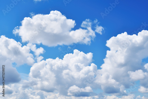 Beautiful blue sky with white clouds background © Jasmina