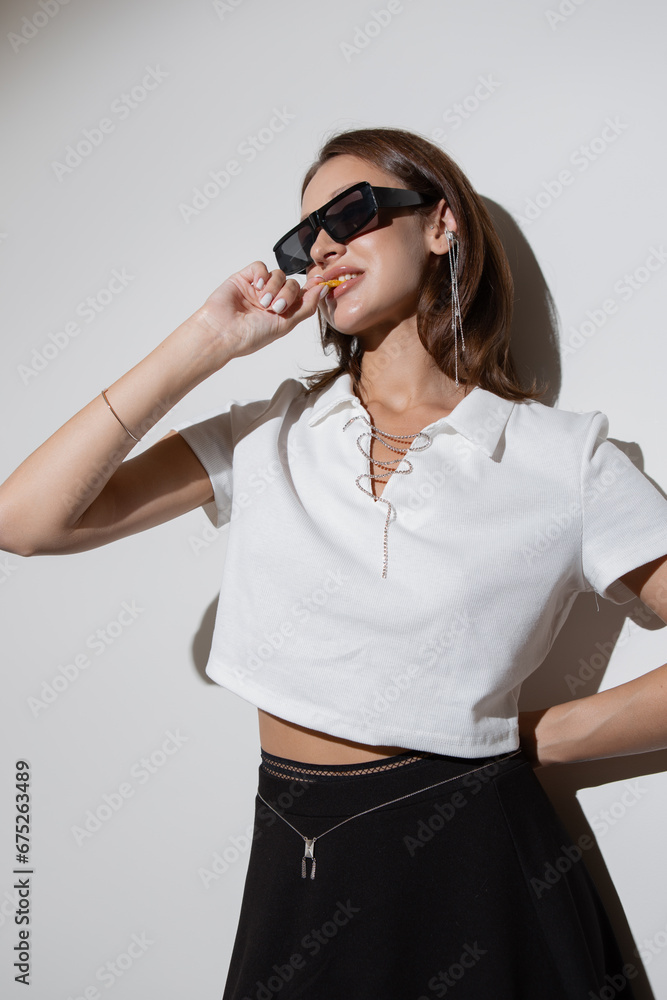 Stylish fashion girl with makeup and accessories, fashion shoot Stylish fashion girl with makeup and accessories, fashion shoot