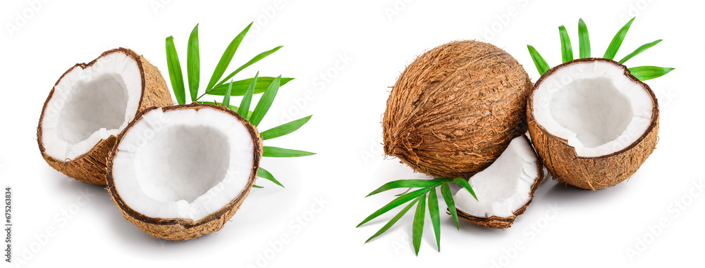 half of coconut with leaves isolated on white background