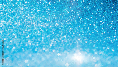 Shining sparkling blue blurred background for holiday design. Christmas abstract sparkles, selective focus. Web banner