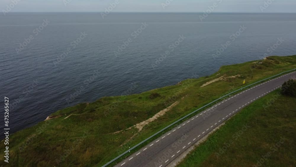 aerial view of beautiful empty coastal road near the sea or ocean aerial view of beautiful empty coastal road near the sea or ocean
