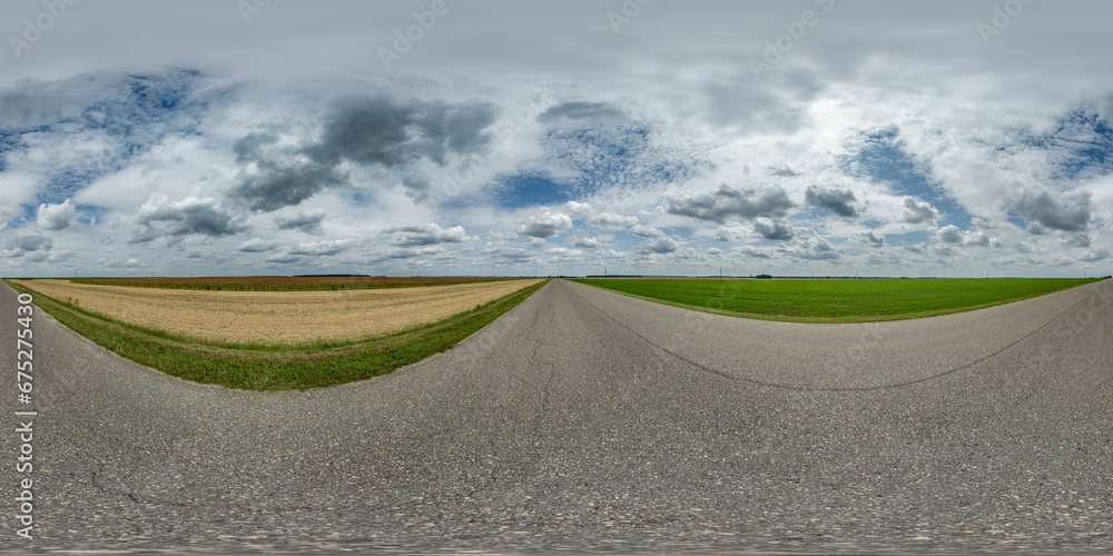 spherical 360 hdri panorama on old asphalt road among fields with clouds and sun on blue sky in equirectangular seamless projection, as skydome replacement in drone panoramas, game development