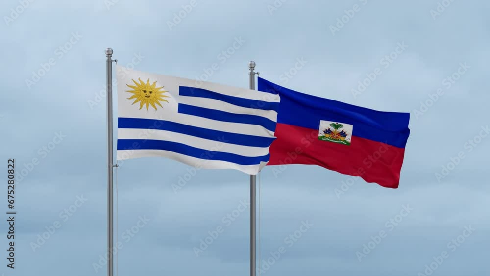 Haiti flag and Uruguay flag waving together on cloudy sky, endless seamless loop, two country relations concept Haiti flag and Uruguay flag waving together on cloudy sky, endless seamless loop, two country relations concept