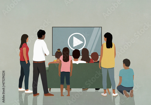 Community watching video with play symbol on television screen
 photo