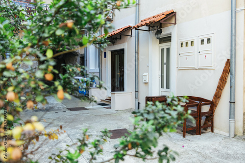 Croatian courtyard in front of the entrance to the vacation apartments photo