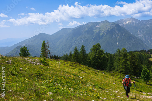 Woman Hiking in Mountains, Velika Planina, Slovenia © Belus