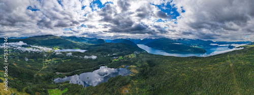 Aerial view of crystal clear reflection of the Fjords and mountains in Norway lake