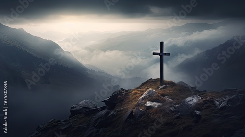 A cross on top of a misty mountain. Religious concept, cross on the top