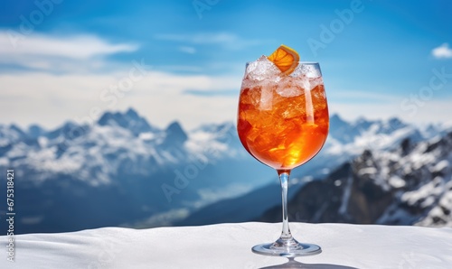 A Refreshing Beverage Enjoyed Atop a Majestic, Snowy Peak