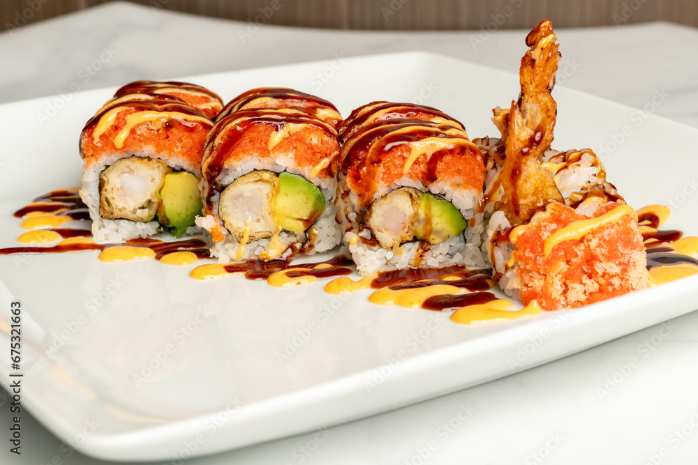 sushi roll with avocado and shrimp tempura sushi roll with avocado and shrimp tempura