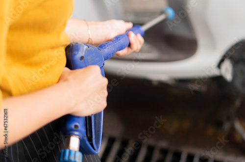 cleaning of the motorcycle at the car wash