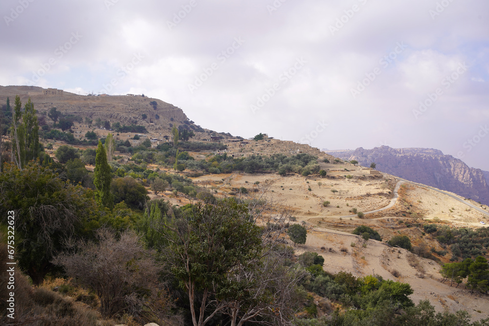 Treking route of beautiful meadow landscape with mountain background in Dana Valley