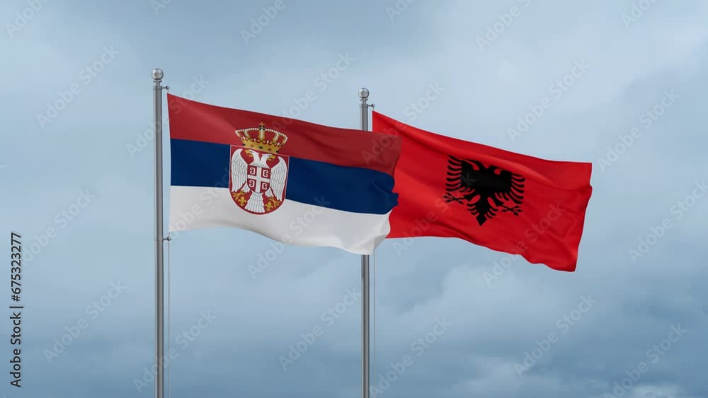 Serbia flag and Albania flag waving together on cloudy sky, endless seamless loop Serbia flag and Albania flag waving together on cloudy sky, endless seamless loop