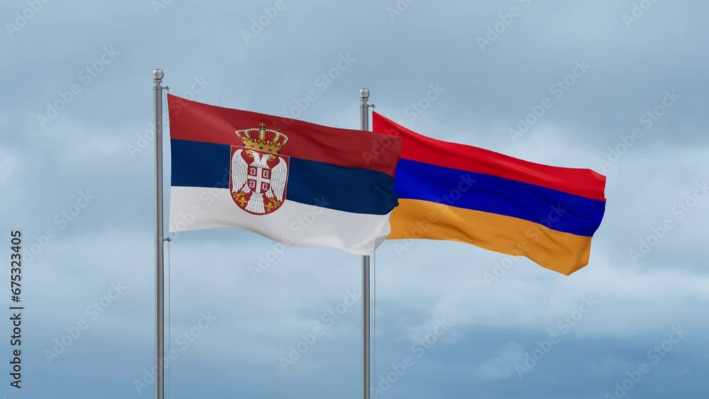 Armenia and Serbia flag waving together on cloudy sky, endless seamless loop, two country cooperation concept Armenia and Serbia flag waving together on cloudy sky, endless seamless loop, two country cooperation concept