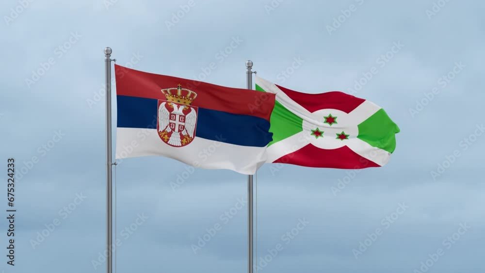 Burundi flag and Serbia flag waving together on cloudy sky, endless seamless loop, two country relations concept Burundi flag and Serbia flag waving together on cloudy sky, endless seamless loop, two country relations concept