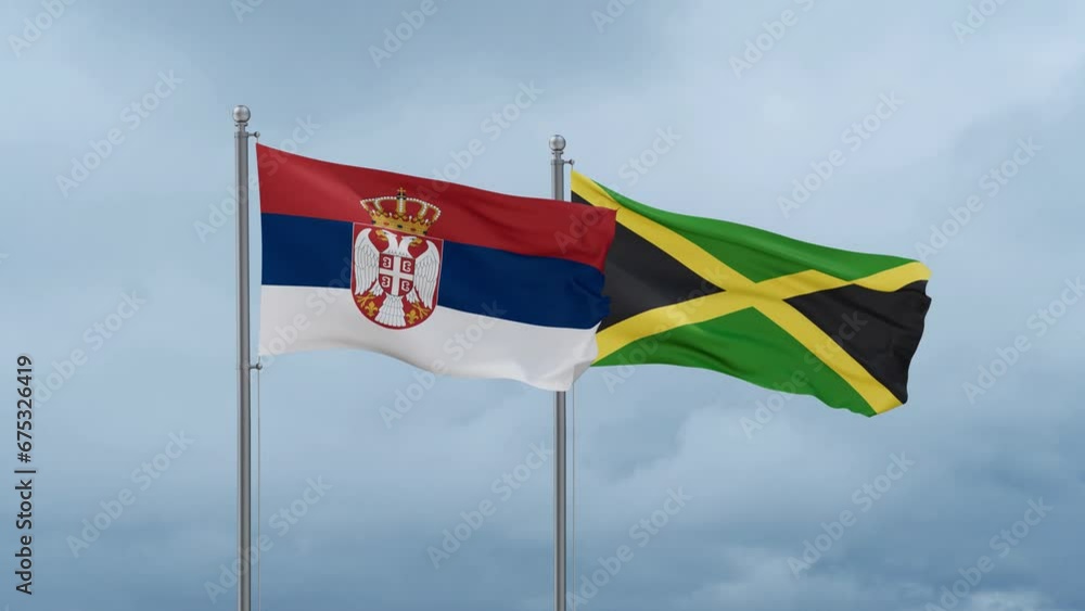 Jamaica and Serbia flag waving together on cloudy sky, endless seamless loop, two country cooperation concept Jamaica and Serbia flag waving together on cloudy sky, endless seamless loop, two country cooperation concept