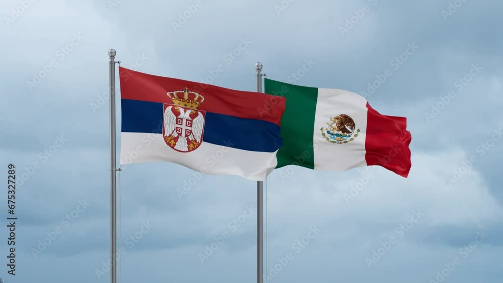 Mexico flag and Serbia flag waving together on cloudy sky, endless seamless loop, two country relations concept Mexico flag and Serbia flag waving together on cloudy sky, endless seamless loop, two country relations concept