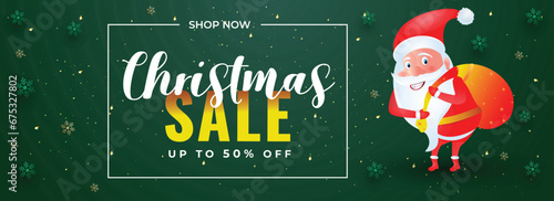 Christmas Sale header or banner design with 50% discount offer and illustration of santa claus lifting a heavy bag on green snowflake background.