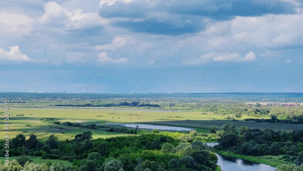 Picturesque view of the Kama River from the observation deck at the Yelabuga settlement. The movement of clouds over the river. Lower Kama National Park. Yelabuga, Republic of Tatarstan, Russia, 4K Picturesque view of the Kama River from the observation deck at the Yelabuga settlement. The movement of clouds over the river. Lower Kama National Park. Yelabuga, Republic of Tatarstan, Russia, 4K