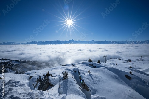 Aerial view of the snowy Cran-Montana under a sunny sky in Switzerland photo