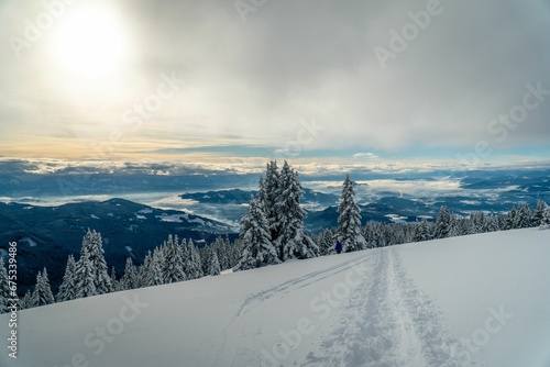 Stunning winter landscape in Austria showcases an impressive snow-covered mountain slope