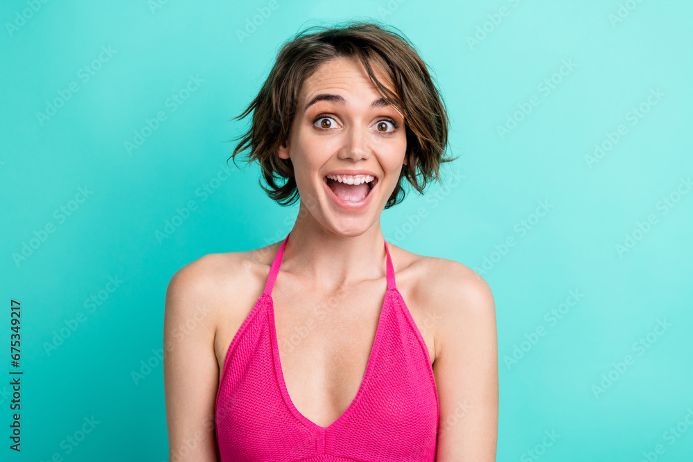 Photo of overjoyed gorgeous girl wear swimsuit have fun rejoice summer vacation party isolated on aquamarine color background