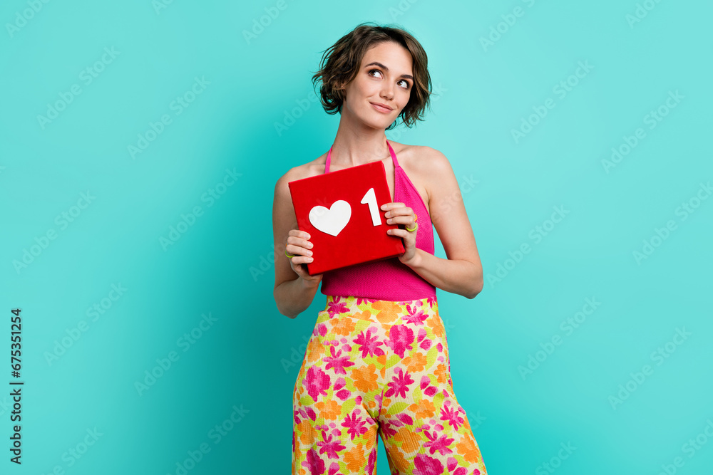 Photo of charming lovley girl wear pink trendy clothes look up empty space dream popularity isolated on cyan color background Photo of charming lovley girl wear pink trendy clothes look up empty space dream popularity isolated on cyan color background