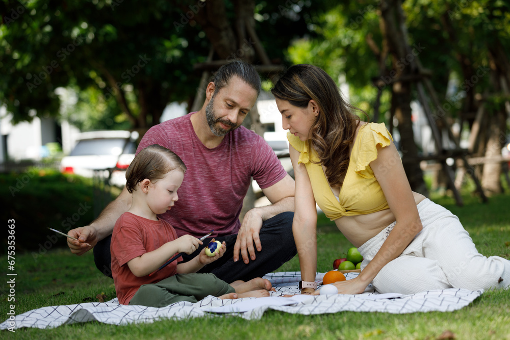 Happy family day, father, mother, son, Caucasian enjoying watercolor painting and picnic in nature. Happy family day, father, mother, son, Caucasian enjoying watercolor painting and picnic in nature.