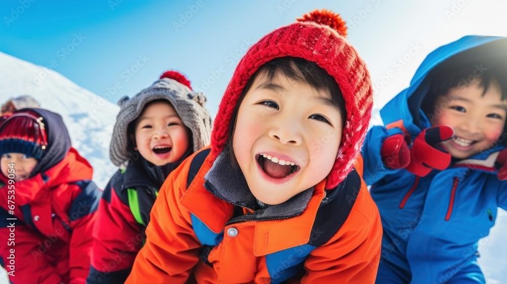 A group of children playing in the snow A group of children playing in the snow