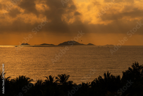 Sea, islands and palm trees near the Vietnamese city of Nha Trang at sunrise