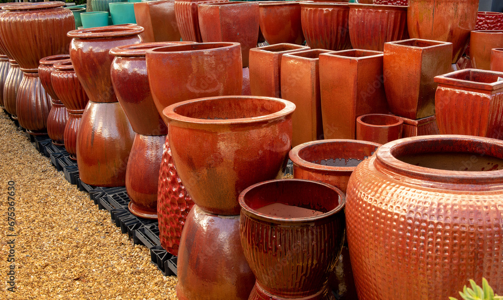 Glossy ceramic flower pots and plant pots for plants. - obrazy, fototapety, plakaty 