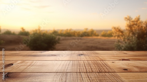 A wooden table top with a blurry background photo