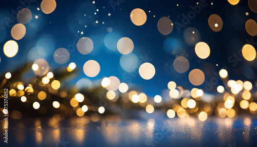 Christmas bokeh lights over dark blue background