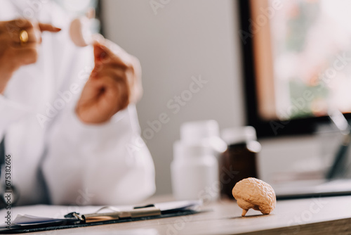 Female doctor holding virtual Lungs in hand. Handrawn human organ, copy space on right side, raw photo colors. Healthcare hospital service concept stock photo