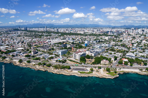 Beautiful aerial view of the city of Santo Domingo - Dominican Republic with is Parks, buildings, suburbs ,turquoise Caribbean ocean, parks and malecon photo