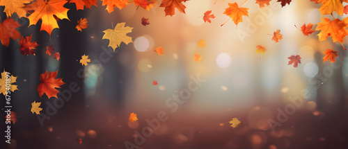 Colorful panoramic autumn background with orange leaves and blurred background