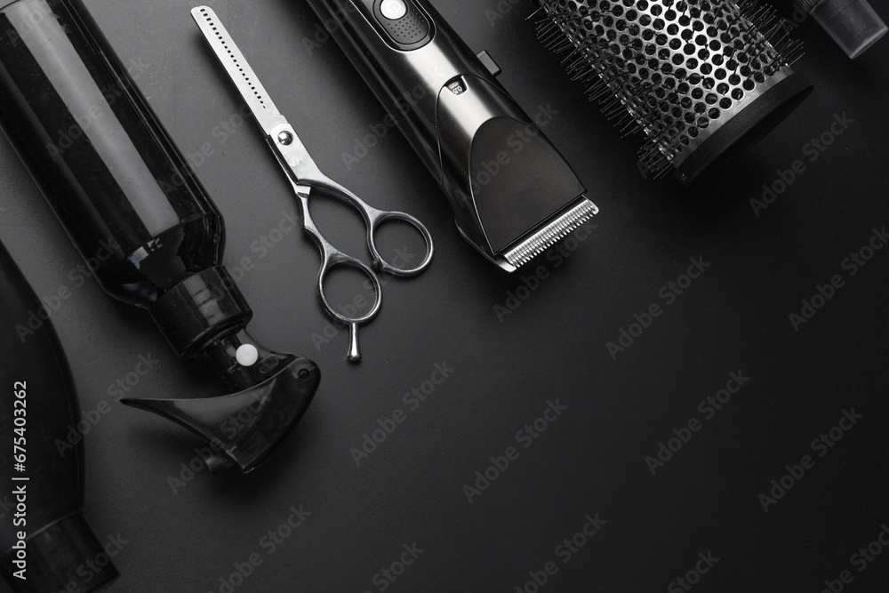 Barbershop concept. Hairdressing tools on dark background top view space for text. Hair extensions, materials and cosmetics, hair care, wig. Hairstyle, haircut in salon. - obrazy, fototapety, plakaty 
