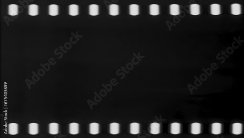 Retro vintage videotape rolling 35mm film motion. Old Film Look Photo Filter with dirt, scratches, hair, dust, flickers, light leaks, grainy texture, film flash, film burns. High quality 4k footage