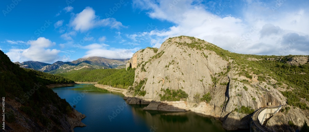 Mountain landscape and hydroelectric dam in Guara Mountains in Spain.