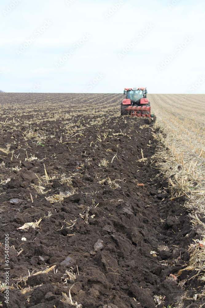 Fototapeta premium A tractor in a field
