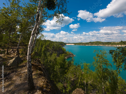 Lake landscape with turquoise water summer sunny day
