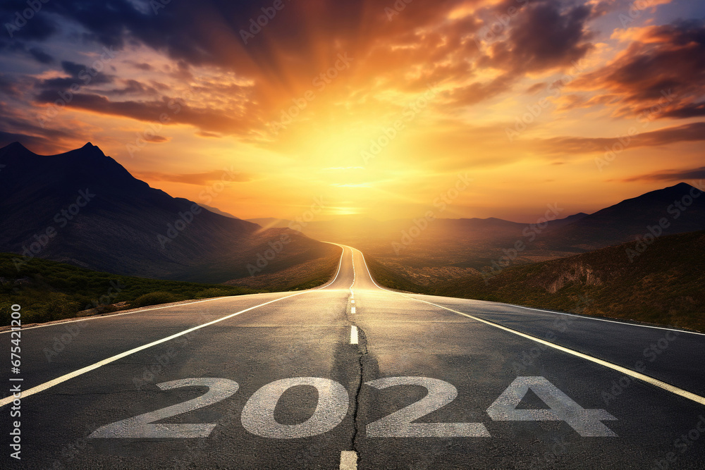 Obraz premium 2024 New Year Beginning Concept: '2024' Written on a Road with Sunset Mountain Background. Beautiful Evening with Copy Space for Text, Banner, or Poster