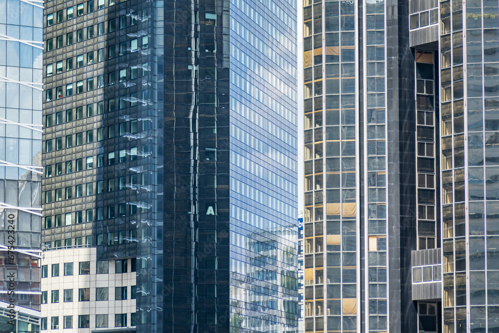 Glass windows of skyscrapers of La Defense business district Glass windows of skyscrapers of La Defense business district