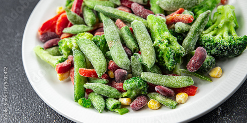 vegetable frozen mix broccoli, corn, carrot, green pea, green bean, bell pepper, bean fresh vegetables delicious healthy eating cooking appetizer meal food snack on the table copy space food