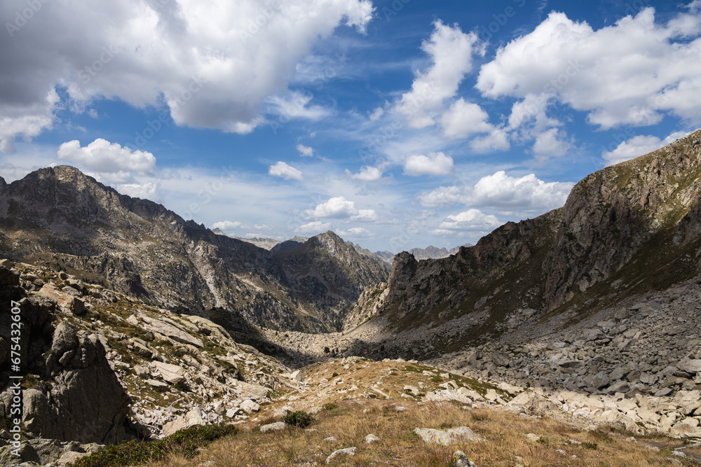 Beautiful landscape of the natural park of Aigestortes y Estany de Sant Maurici, Pyrenees valley with river and lake Beautiful landscape of the natural park of Aigestortes y Estany de Sant Maurici, Pyrenees valley with river and lake