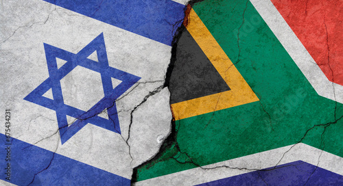 Israel and South Africa flags, concrete wall texture with cracks, grunge background, military conflict concept
