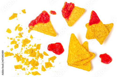 Corn chips nachos and salsa sauce isolated on white background, top view. Flat lay. Meican Food Creative layout. photo