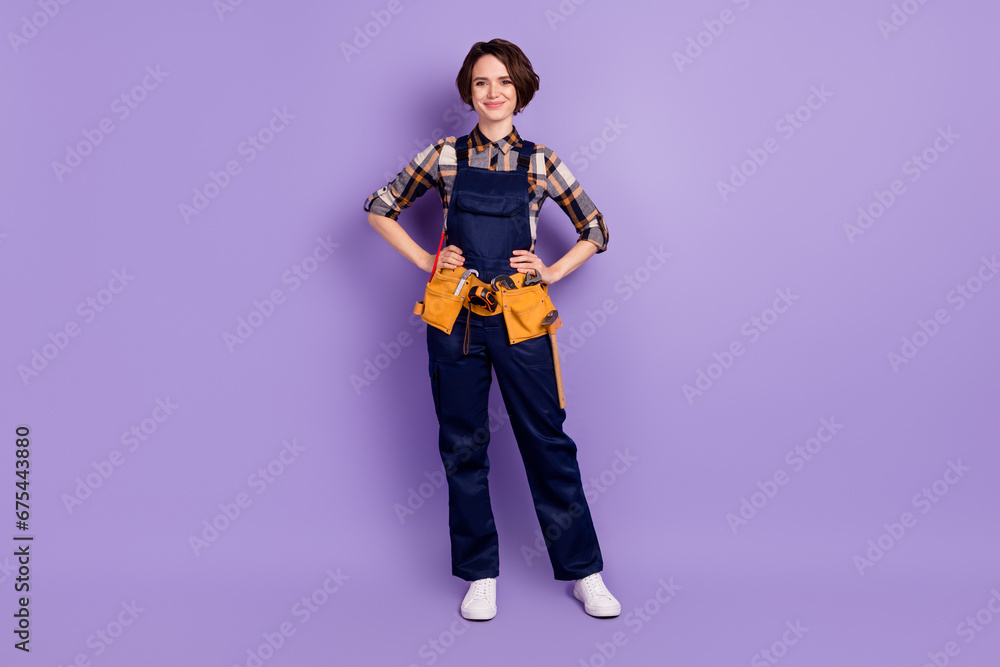 Full size photo of young woman happy smile repairer builder tools isolated over violet color background